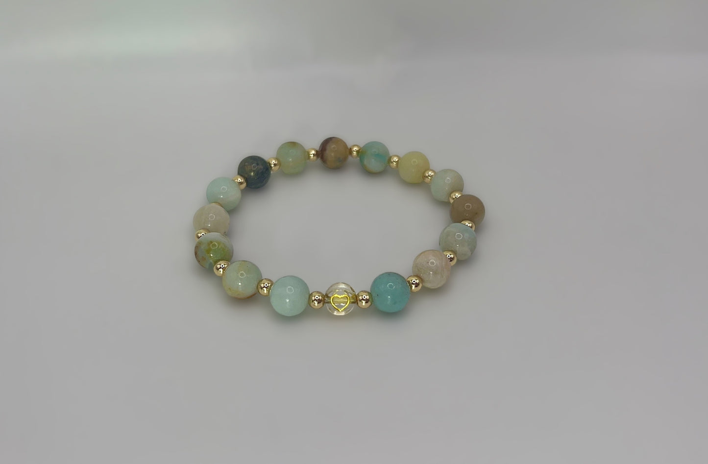 AAA Amazonite with gold spacers and charm